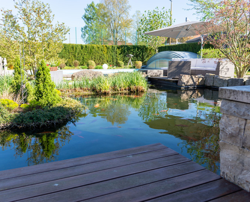 Lukas Kümmel Garten- und Landschaftspflege – Garten mit Teich, Pool und Sitzecke